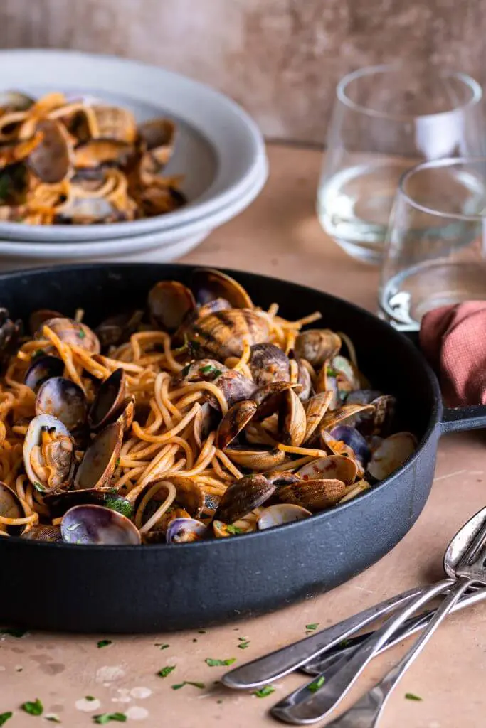 Spaghetti met vongole en nduja