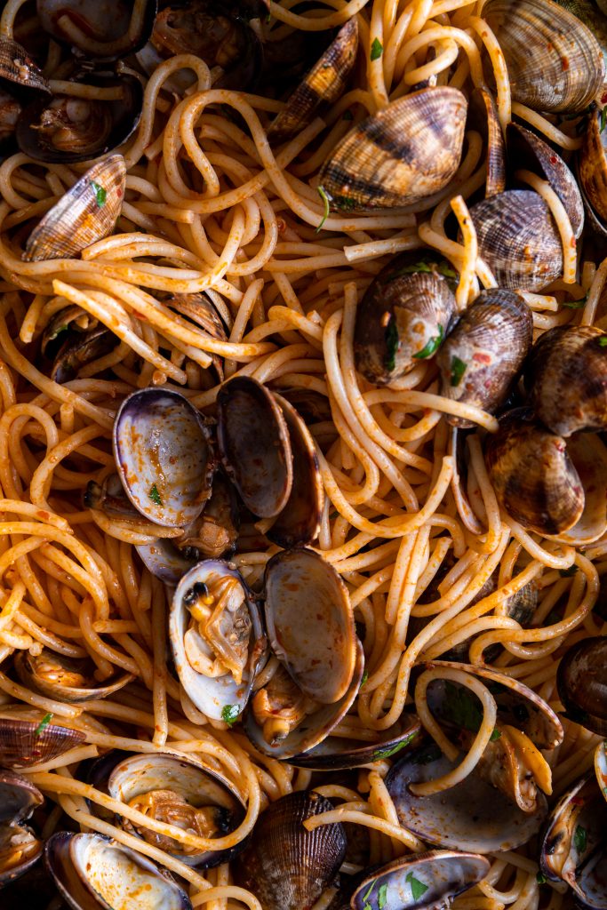 Spaghetti vongole met nduja