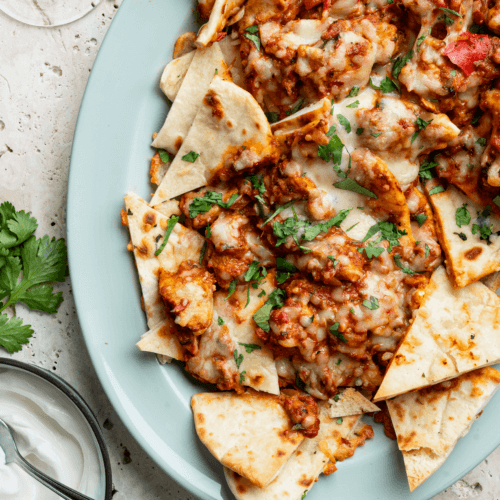 Butter chicken nacho’s met naan