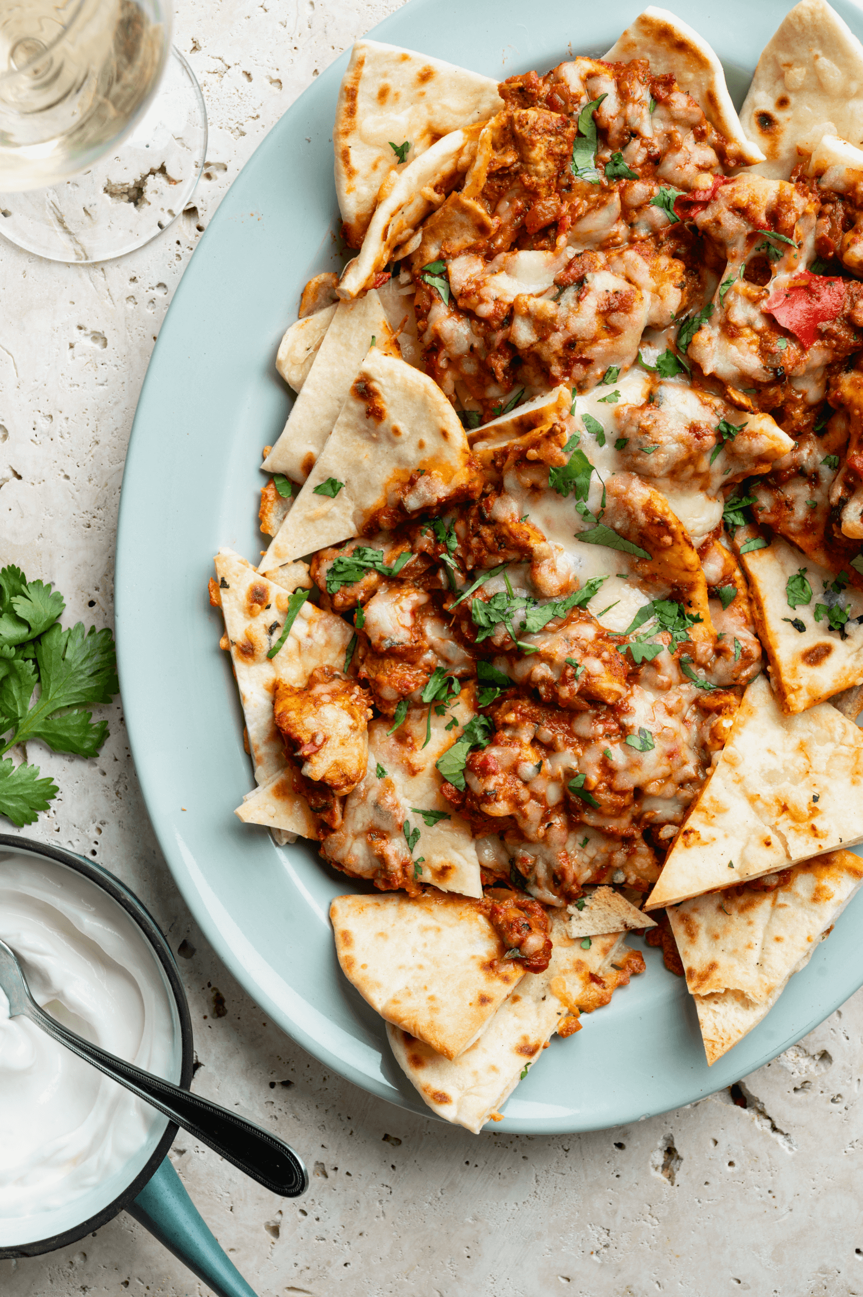 Butter chicken nacho’s met naan